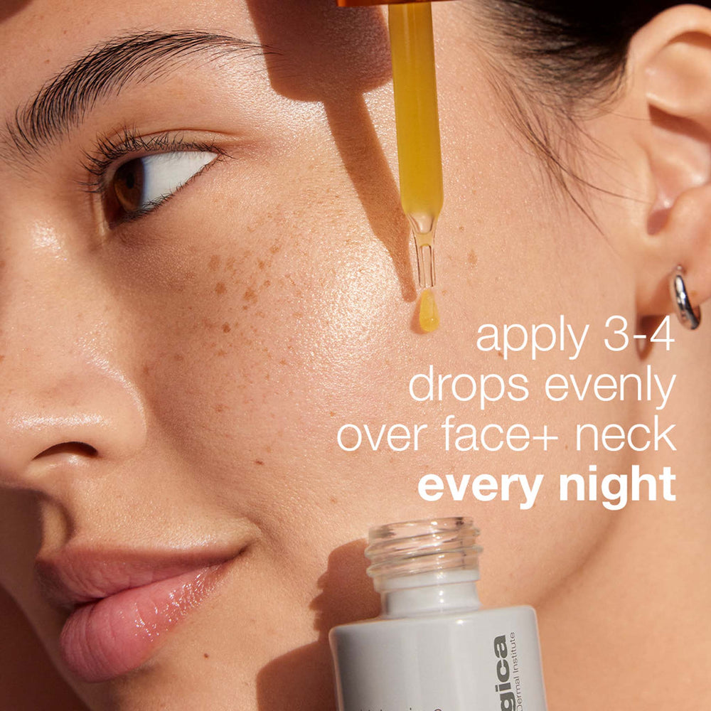 Close-up of a woman's face with a dropper applying Dermalogica biolumin-c night restore