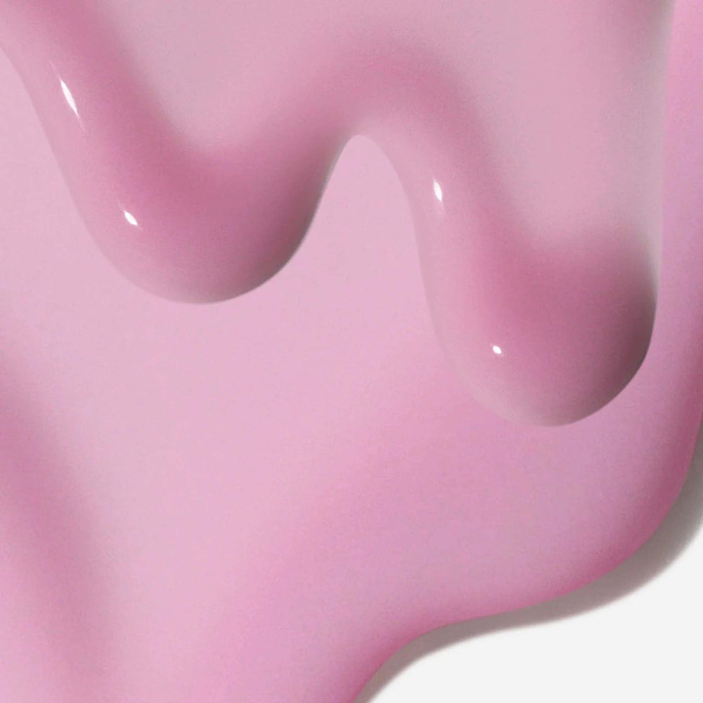 Close-up of a pink, glossy object with a smooth texture.