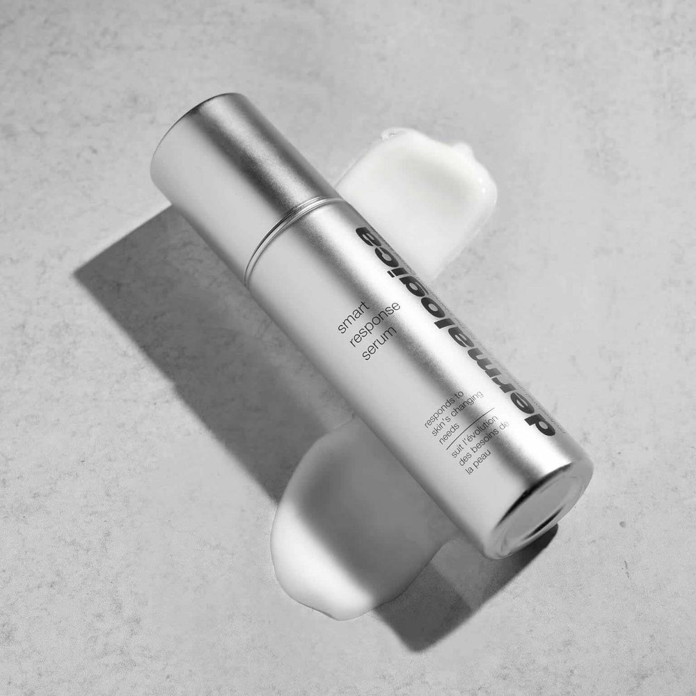 dermalogica smart response serum bottle with white cap on a gray background